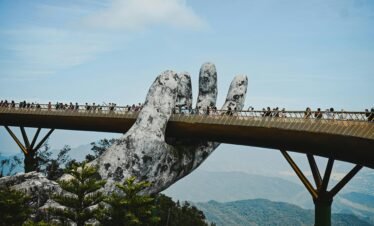 The iconic Golden Bridge held by giant hands at Ba Na Hills, Da Nang.
