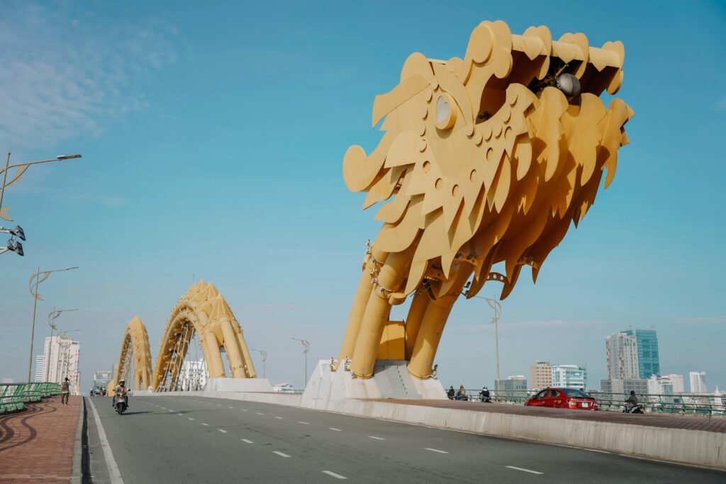 Stunning view of the iconic Dragon Bridge in Danang under a clear blue sky.